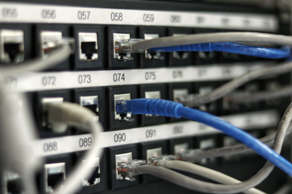 High-density fiber optic switches and network interconnects in an enterprise AI datacenter server rack